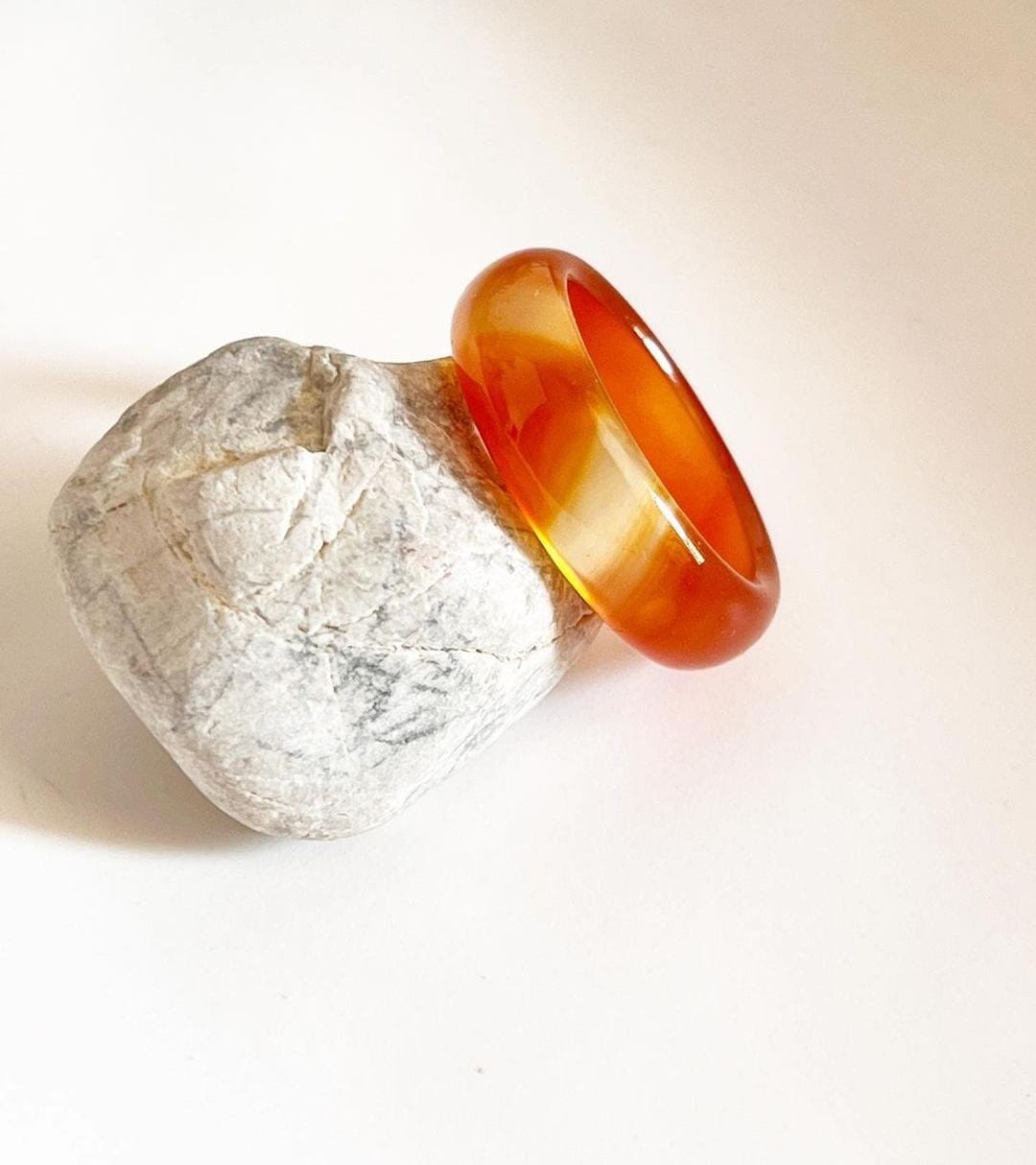 Elegant carnelian crystal band ring with polished finish