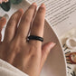 Sophisticated black agate crystal ring with a sleek band design.
