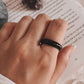 Elegant black agate crystal ring featuring a bold band design.