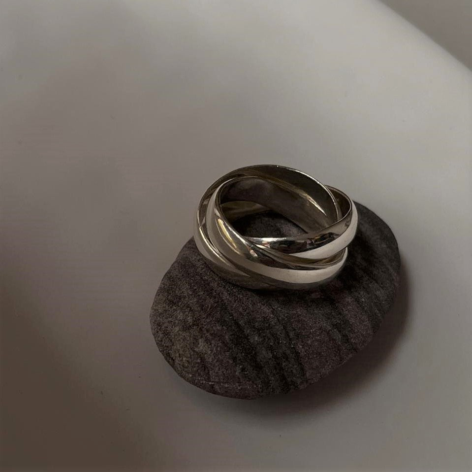 Contemporary silver ring with three chunky, rolling bands