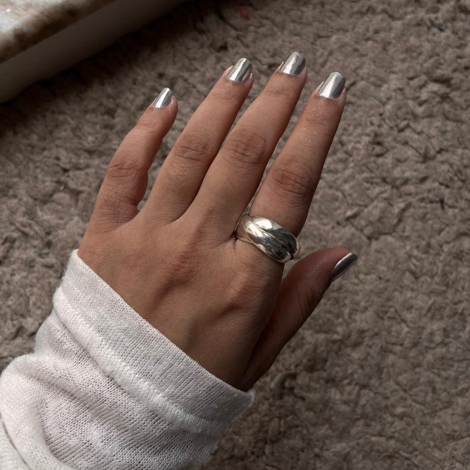 Stylish silver ring with three interlinked chunky bands