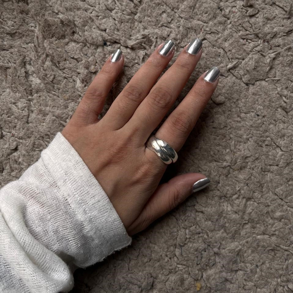 Handcrafted silver ring with interlinked rolling bands in a chunky design