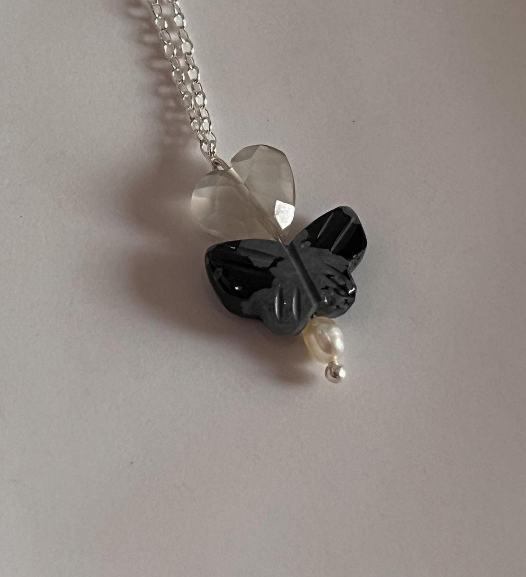 Butterfly Necklace with Black Jasper, Pearl, and Grey Moonstone Heart 