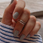 Close-up of double stack adjustable silver ring, perfect for mid or little finger