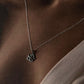 Handcrafted silver necklace with a beautiful rose charm