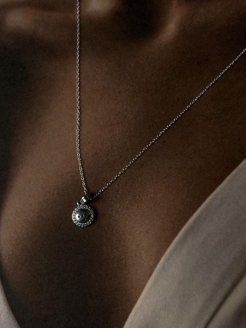 Charming sun face pendant in sterling silver