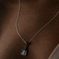 Guitar-shaped pendant necklace in sterling silver