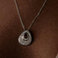 Close-up of Drop 1 silver necklace with minimalistic pendant