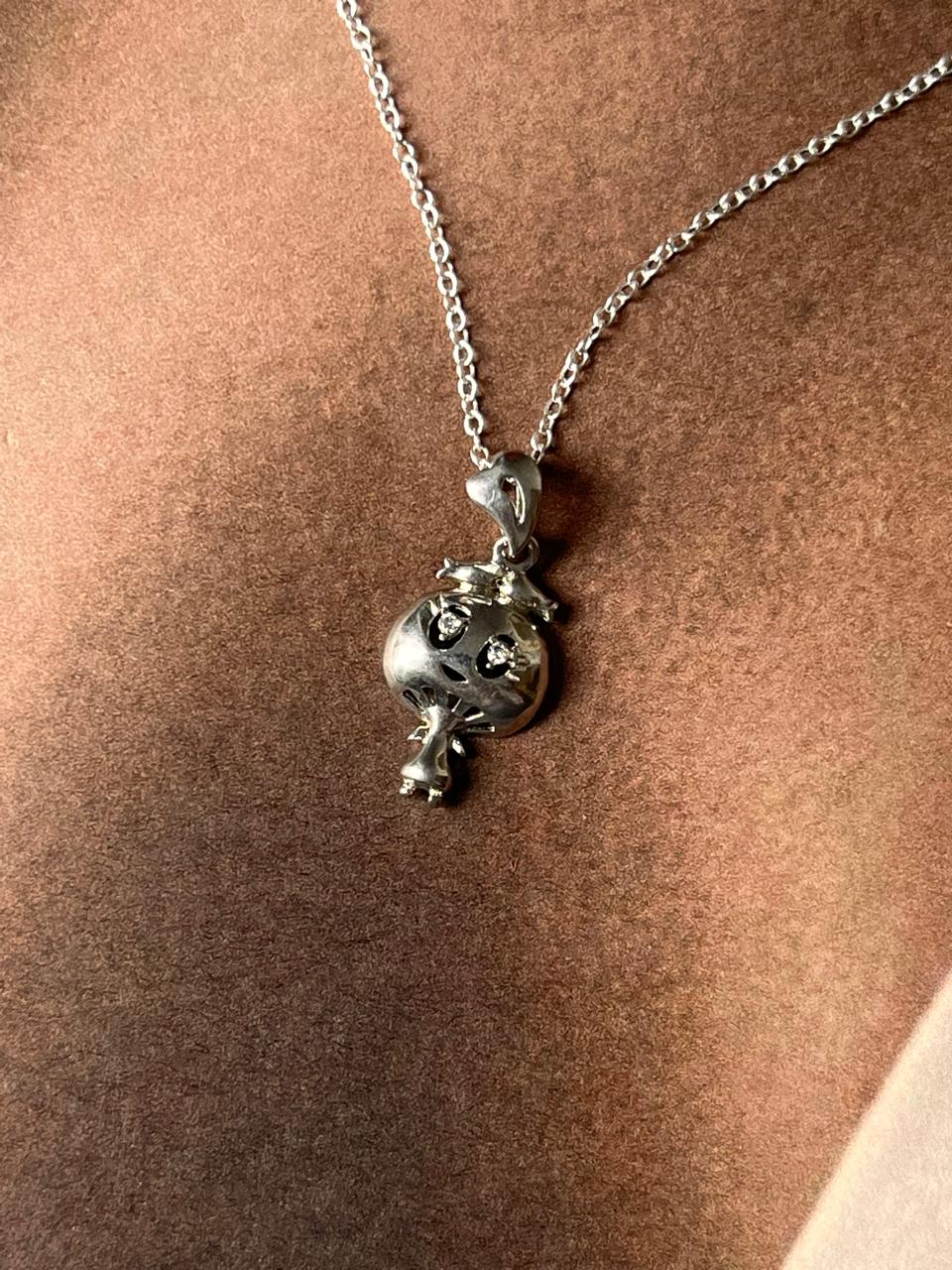 Close-up of crab 3 silver necklace with unique crab design