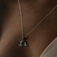 Sleek and minimalist cycle 2 pendant necklace in polished silver