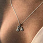 Modern cycle 2 pendant on a sleek silver necklace chain