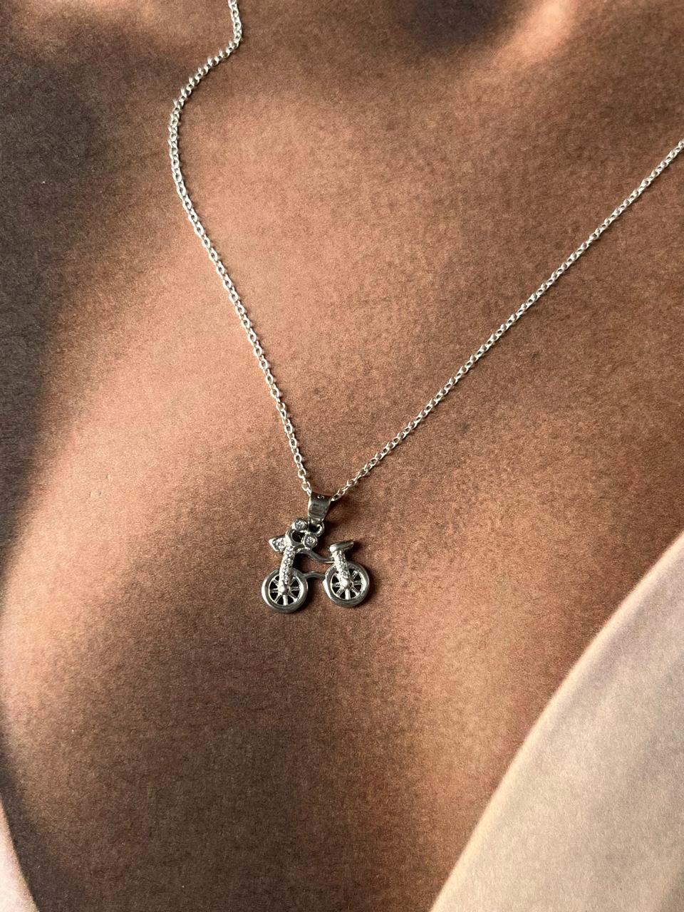 Modern cycle 2 pendant on a sleek silver necklace chain