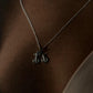 Chic silver necklace featuring a stylish cycle 2 pendant