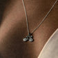 Stylish silver necklace featuring a unique cycle 1 pendant