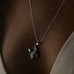 Modern X silver charm necklace