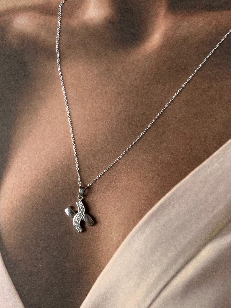 Sleek X design sterling silver necklace