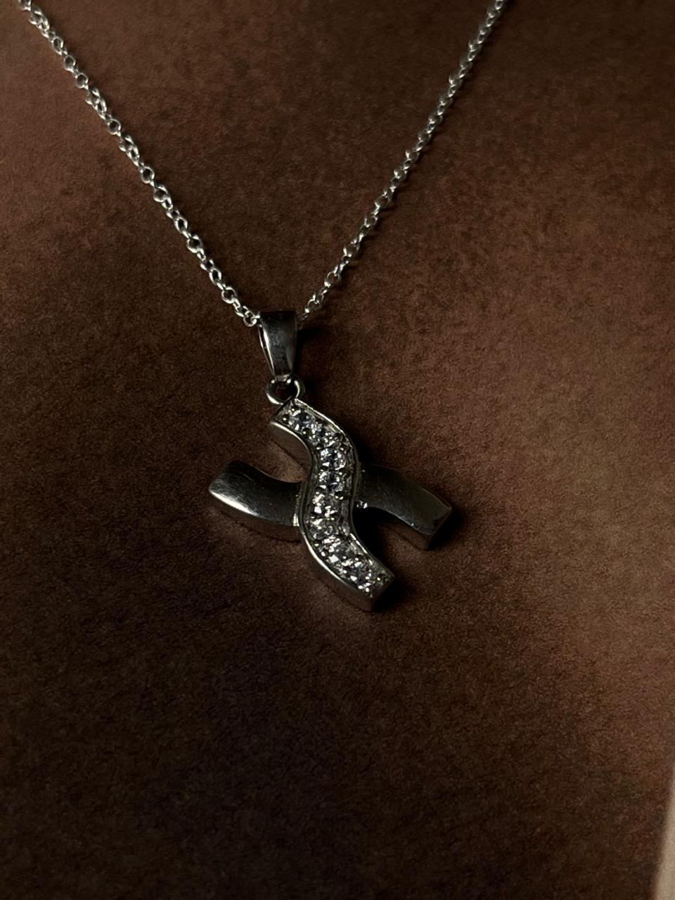 Silver necklace with X-shaped pendant