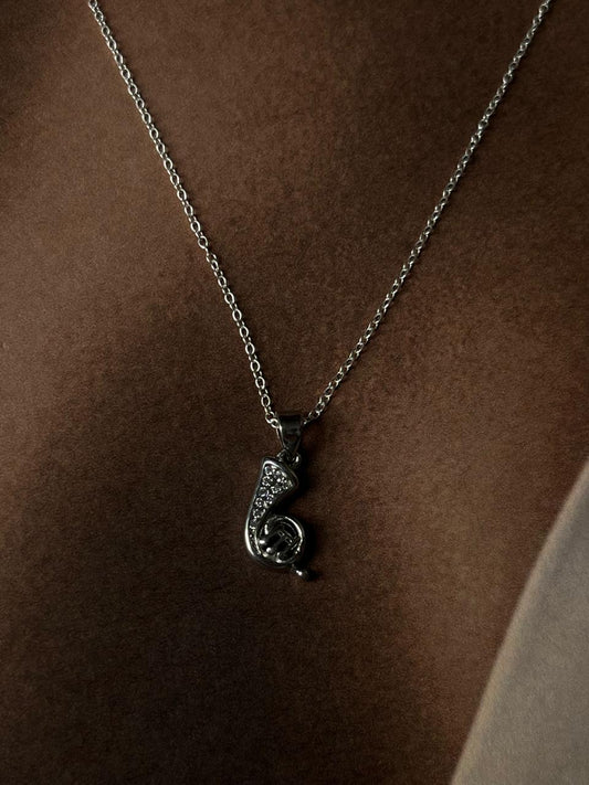 Unique Bigul music instrument silver necklace with intricate design.