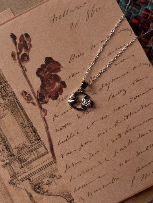Elegant Fish 5 silver necklace featuring intricate aquatic design