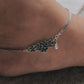 Timeless floral drop silver anklet featuring dangling flower charms