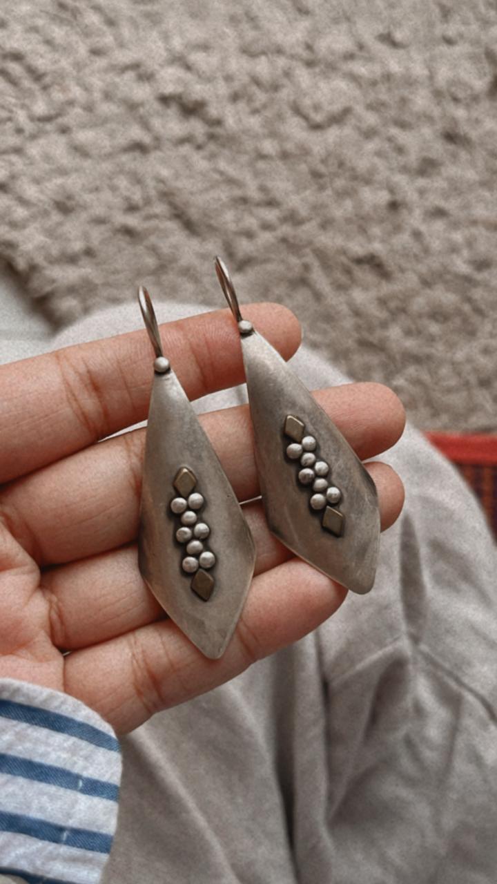Charming tribal Rawa hook earrings in handcrafted silver