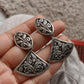 Handcrafted antique Chitai silver earrings with intricate detailing.