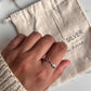 Timeless arrow band silver ring with intricate detailing.