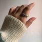 Chunky silver 925 ring with adjustable band and braided twist design