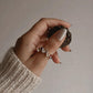 Sterling silver band ring featuring seven chakra stones