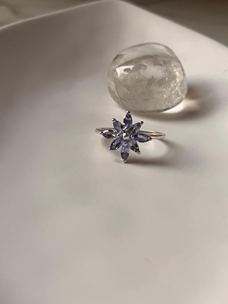 Elegant tanzanite floral ring in sterling silver