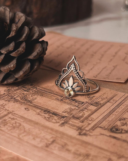 Boho-style silver ring featuring a citrine stone in a crown setting