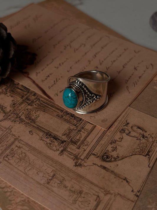 Timeless faux turquoise adjustable silver ring with a sleek, adjustable fit