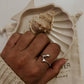 Timeless sterling silver ring featuring a graceful dolphin motif