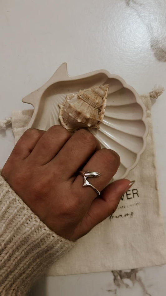 Timeless sterling silver ring featuring a graceful dolphin motif