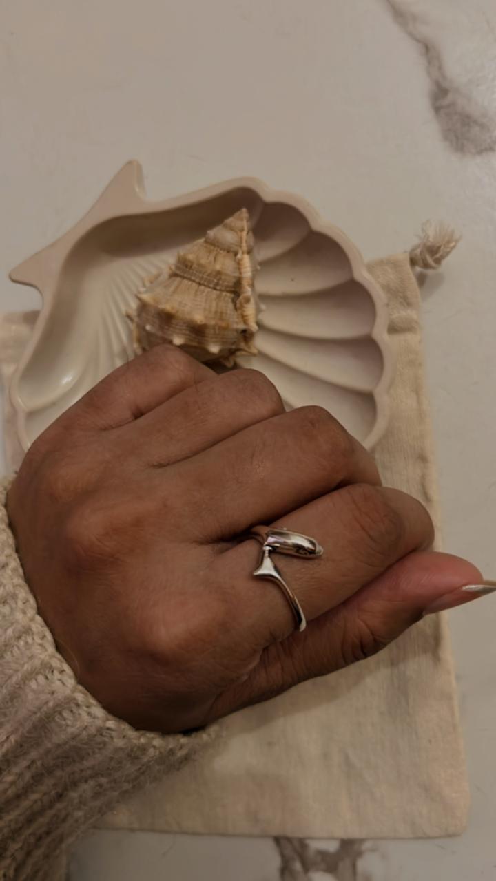 Charming dolphin-shaped silver ring with polished finish
