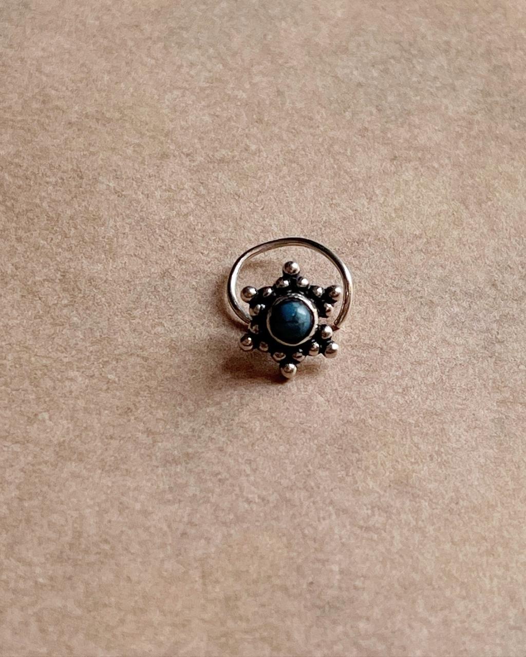 Close-up of Tribal Rawa turquoise nose pin in 925 sterling silver with wired back
