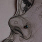 Tribal-inspired silver nose pin featuring turquoise stone and wired back design