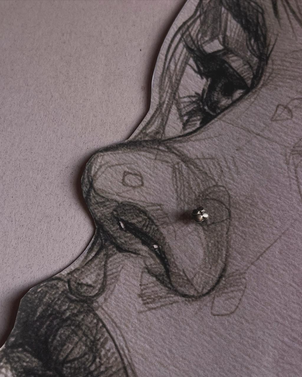 Close-up of Tribal Rawa flower nose pin in 925 sterling silver