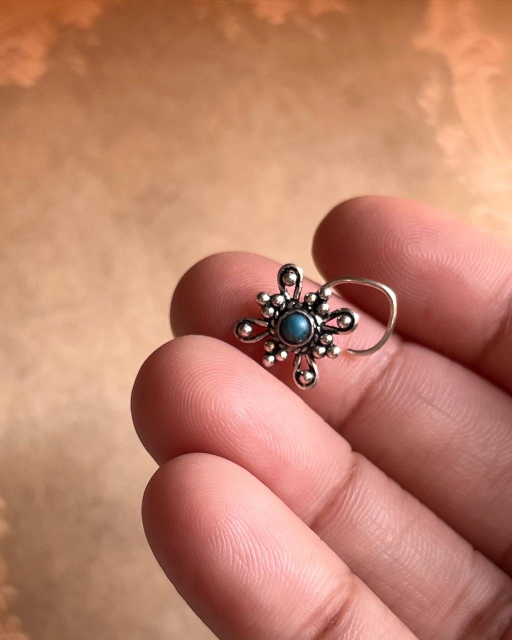 Close-up of Tribal Rawa turquoise nose pin in 925 sterling silver