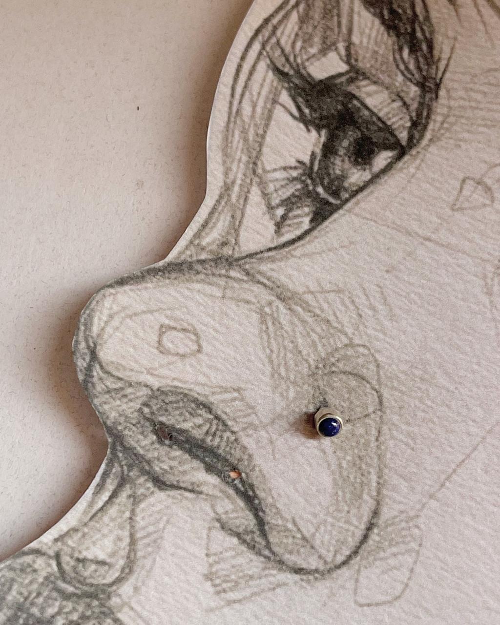 Close-up of Lapis Lazuli nose pin with secure screw back design