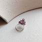 Tribal silver nose pin featuring pink CZ stone with wired back design