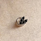 Close-up of Tribal Rawa Black CZ Stone Silver Nose Pin with wired back design