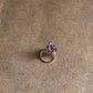 Handcrafted silver nose pin with pink cubic zirconia stone and tribal rawa motif