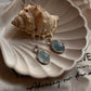 Large oval aquamarine gemstone set in sterling silver pendant