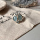 Handcrafted aquamarine and blue topaz cluster ring with 4 stones