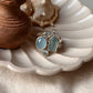 Elegant stone aquamarine and blue topaz cluster ring in silver