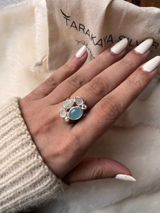 Sterling silver ring with aquamarine, blue topaz, and moonstone gemstones