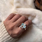 Elegant aquamarine and blue topaz cluster silver ring