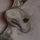 Elegant tribal rawa silver nose pin with green CZ gemstone