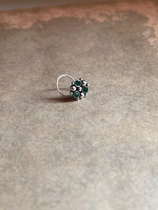 Handcrafted tribal rawa nose pin with green CZ stone in 925 Sterling Silver